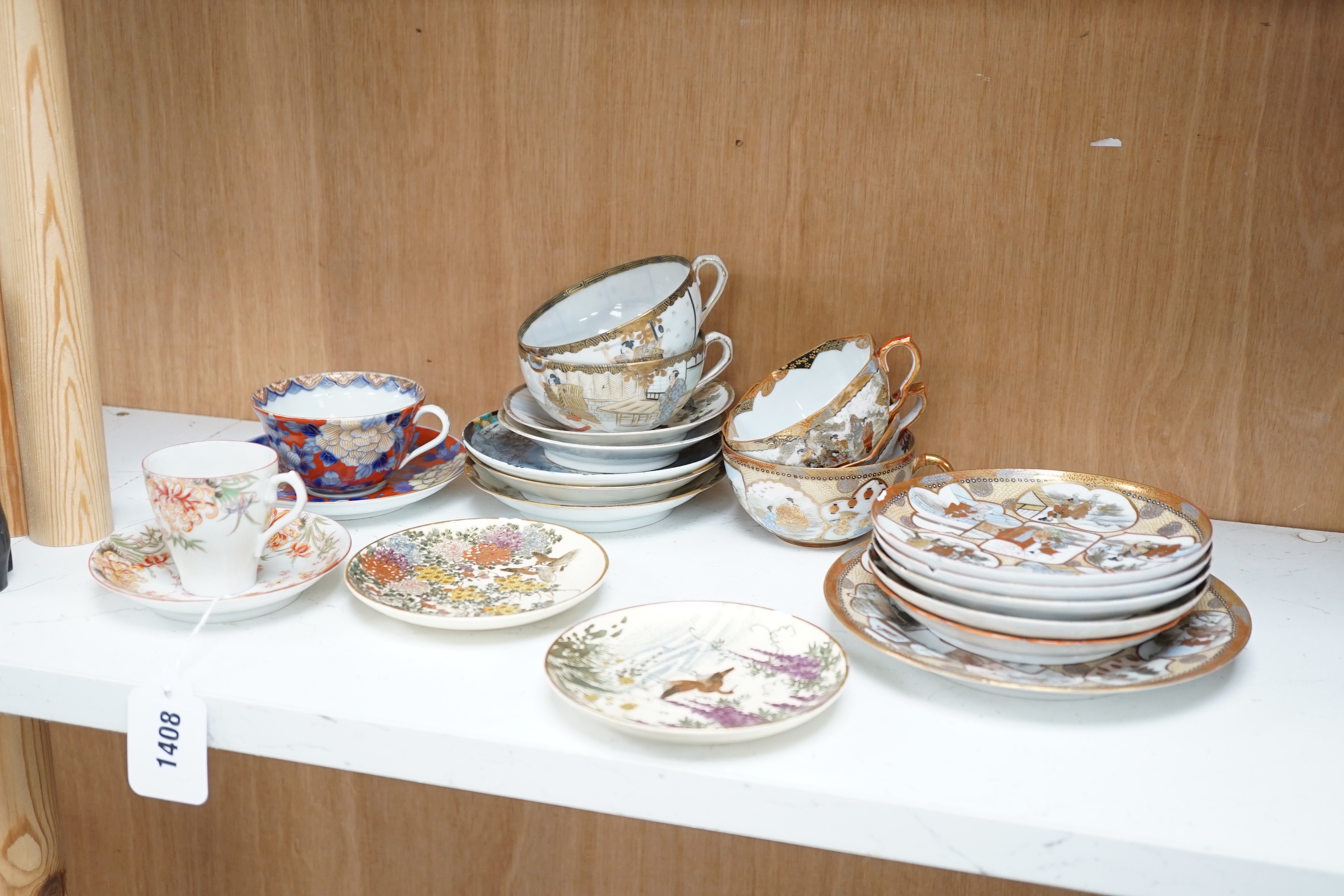 A group of Japanese ceramics, Meiji period and later including satsuma saucers and Imari cup and saucer, largest 17cm in diameter